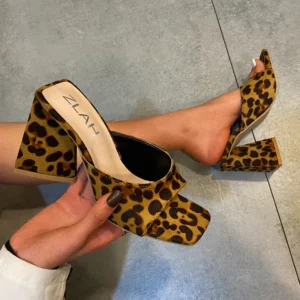 Leopard print block-heel mules on foot