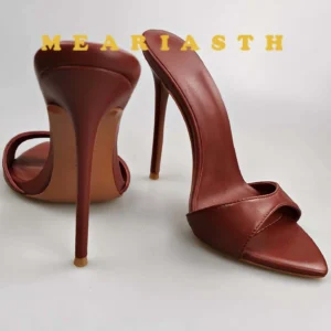 Pair of brown stiletto mule sandals