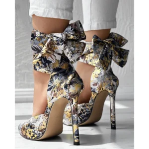 Floral stiletto heels with ankle bows