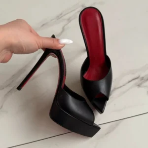 Black platform stiletto mules with red insoles