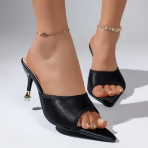 Black open-toe heeled mules with anklets