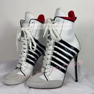 White lace-up high-heeled ankle boots with black stripes