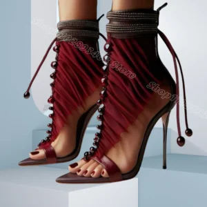Burgundy lace-up stiletto sandals with ankle ties