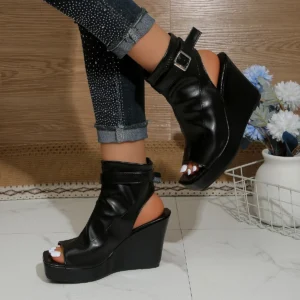 Black wedge platform ankle boots with buckle