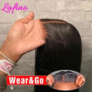 Hand holding black lace frontal wig