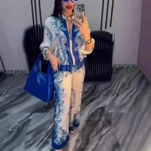 Person in blue patterned outfit with tote